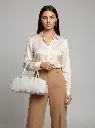 Girl_holding_and_wearing_bag_202607011758.webp